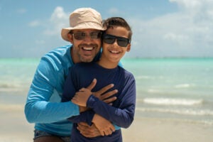 Father and son with protective eye wear