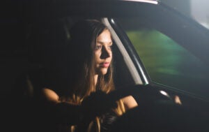 Woman Behind The Wheel