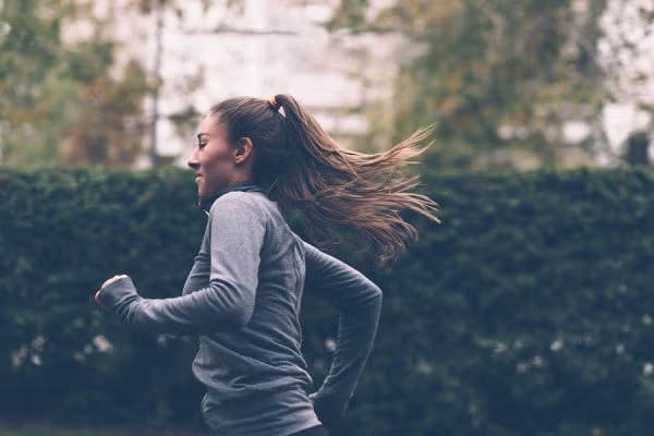 Women running in garden