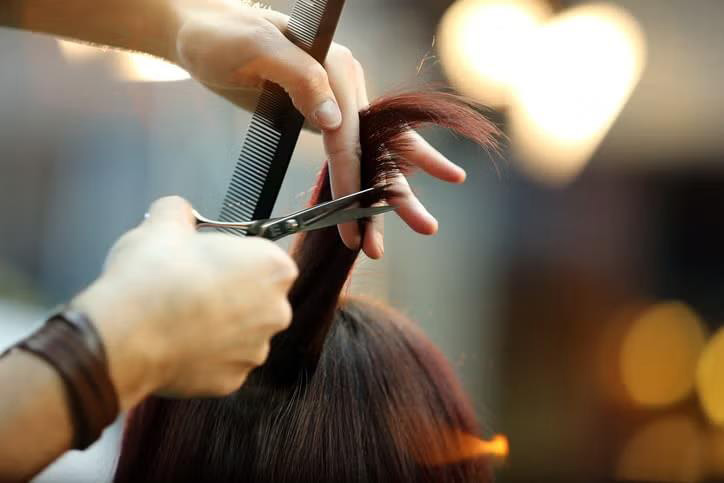 A man getting his hair cut