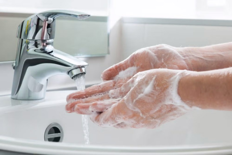 A man washing his hand