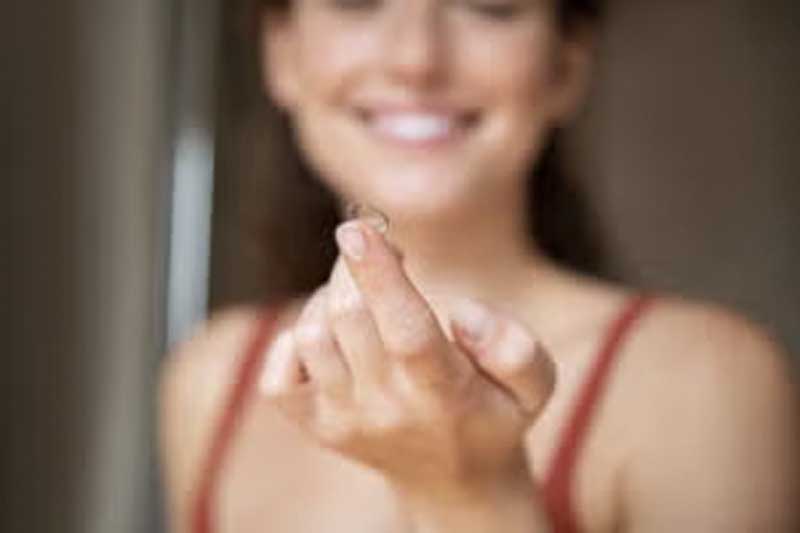 girl holding lens