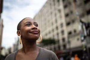 A women smiling in a street