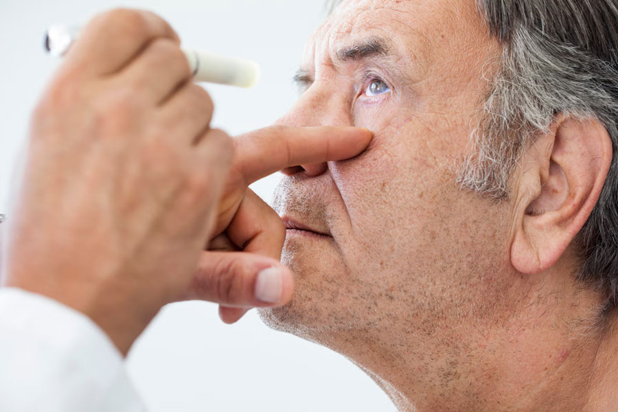 a man getting eye checkup