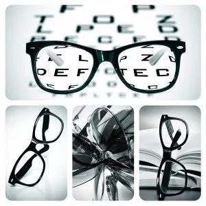 a pair of glasses over an eye chart