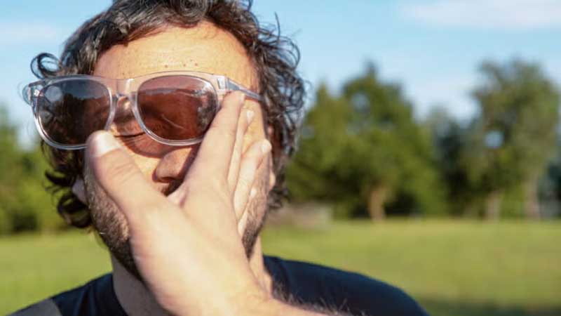person removing glares