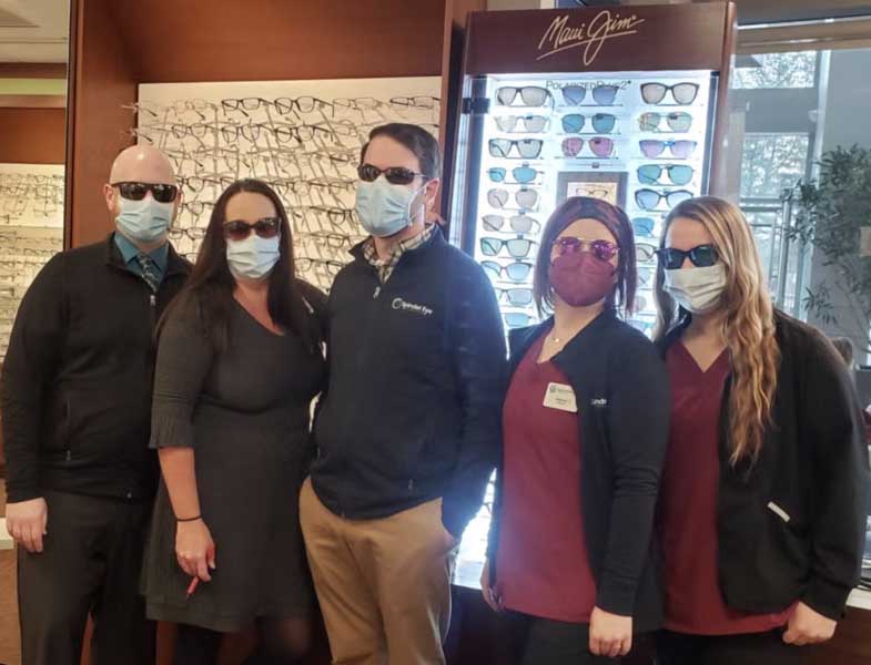 group of people wearing glares and mask
